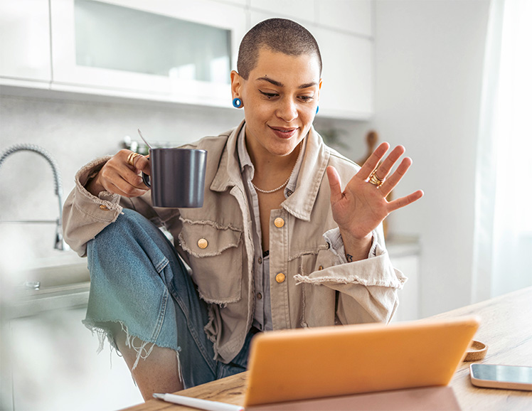 woman looking at laptop