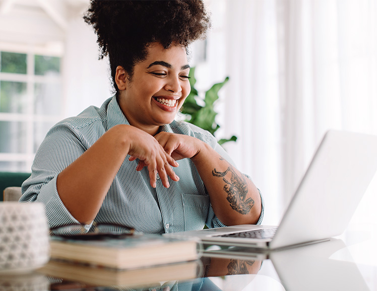 Woman checking laptop