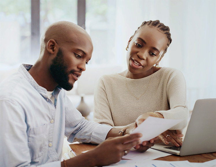 couple reviewing paperwork